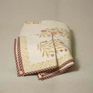 Quilted jaipur bedcover orange and green micro prints